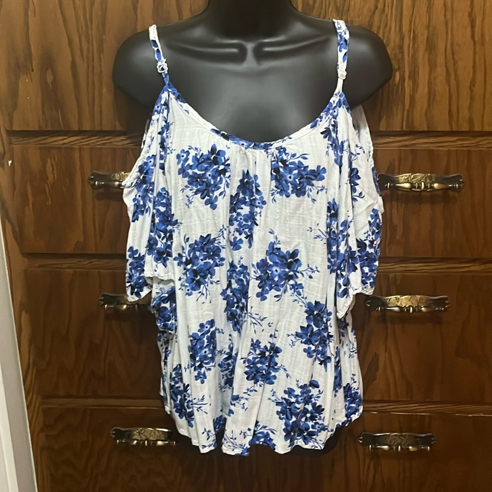 Torrid size 0.  Cold shoulder flowered top